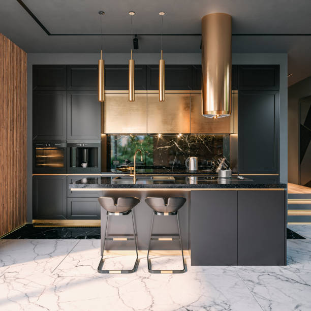 Front view of a modern high black kitchen with rectangular black granite breakfast kitchen island and a corridor with steps on a side stock photo