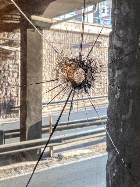 istock Shattered glass next to underground road 1505547913