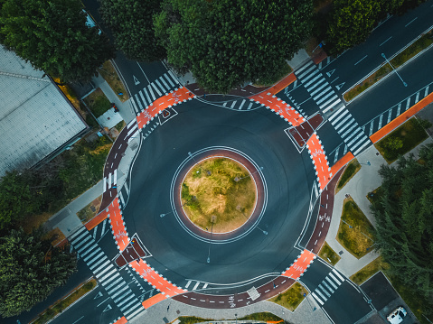 Top view of the road ring in the city in the evening