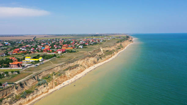 Panorama of sea shore in South Ukraine, Europe. Resort city with nice sand beach and clear blue sea. travel destination, ideal place for comfort vacation on black Sea. Drone photo Panorama of sea shore in South Ukraine, Europe. Resort city with nice sand beach and clear blue sea. travel destination, ideal place for comfort vacation on black Sea. Drone photo. odessa beach stock pictures, royalty-free photos & images