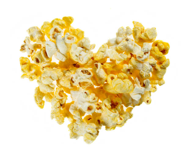 istock Cheese popcorn with heart shape isolated on white background,top view 1505590265