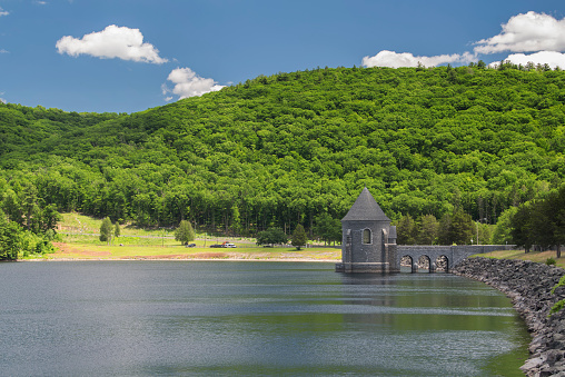 Barkhamsted Reservoir and saville dam on a sunny summer day in Connecticut.