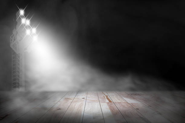istock top desk with light bokeh in concert blur background,wooden table 1505594167