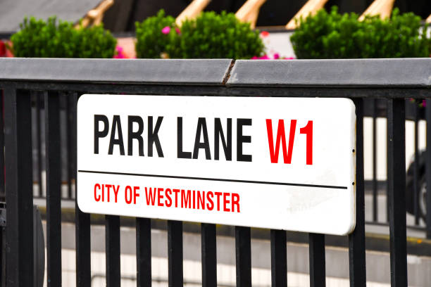 London, England, UK - 28 June 2023:  Sign on railings at the start of Park Lane in central London. It is the location of several luxury hotels.
