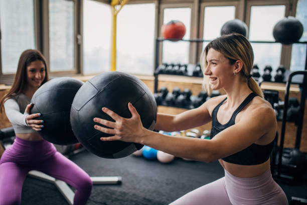 istock Women training with medicine balls 1505597729