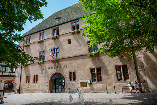 Kaysersberg, France - June 23, 2023: A picturesque view to old town hall in the village of Kaysersberg in Vosces region.