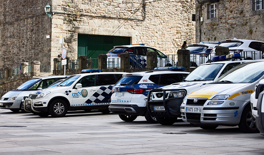 Santiago de Compostela, June 30, 2023. Several Local Police vehicles parked in front of the police station