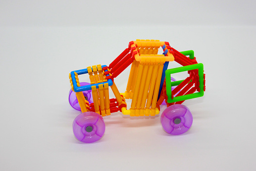 Creative Stick Blocks car model. Colorful Smart Stick Educational Blocks Model on white background. Plastic Smart Stick Intelligence Educational Building Blocks model.