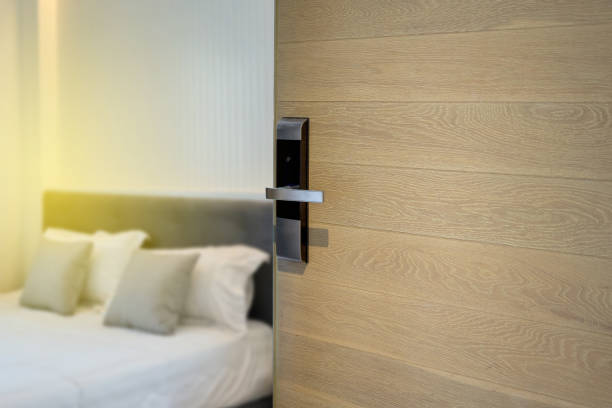 istock Door wooden half opening through interior living room background, selective focus 1505669976