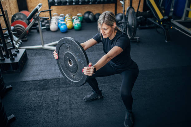 istock Woman exercising with weight 1505675490