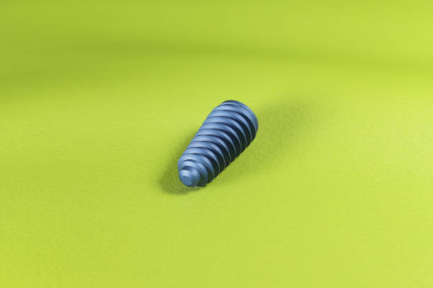 istock dent implant on green background 1505707018