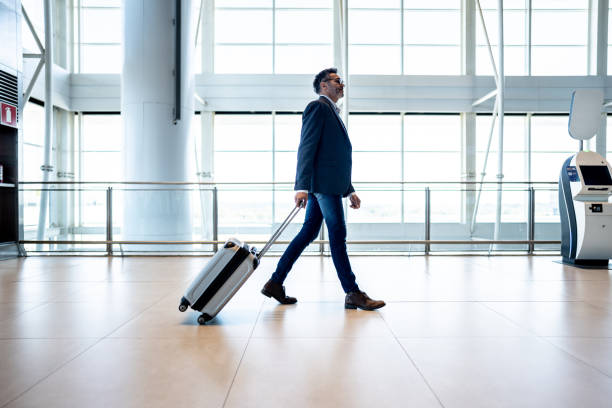 istock Businessman walking at the airport 1505729211