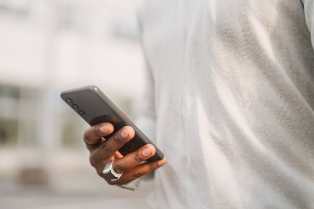 istock Young  entrepreneur with a smartphone in the city 1505730369