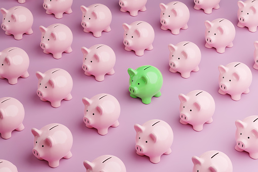 Green piggy bank among rows of pink piggy banks. Illustration of the concept of correct and profitable investment