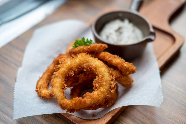 istock Close up of Fried Squid or Calamari served on plate. 1505745994