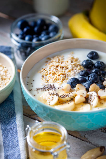 istock Blueberries, banana slices, oat flakes and yoghurt 1505749769