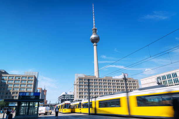 istock Motion-blurred yellow trams on Berlin Alexanderplatz 1505768333