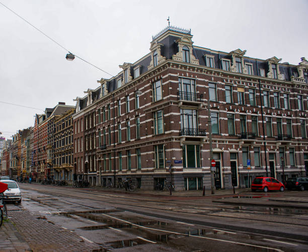 istock Low angle view of buildings against sky during rainy day 1505807975