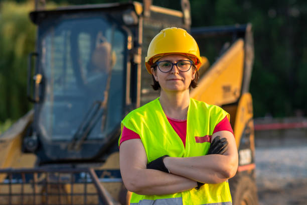 istock Mature woman working at construction site, on break 1505830944