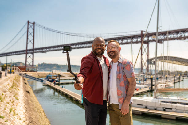 istock Gay couple taking a selfie on the Docas, Lisboa 1505849508