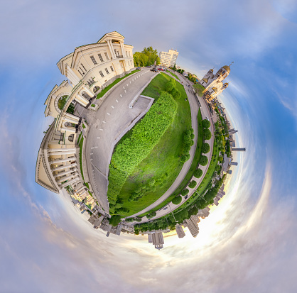 Yekaterinburg, Russia. Historic building of Rastorguev - Haritonov and Temple on Blood in summer sunset, aerial view. Little planet sphere mode. Aerial view. Spherical panorama of the city,