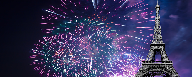 Celebratory colorful fireworks over the Eiffel Tower in Paris, France