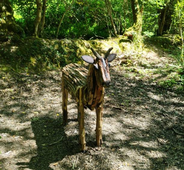 Wooden Buck/Bambi in a canopy forest