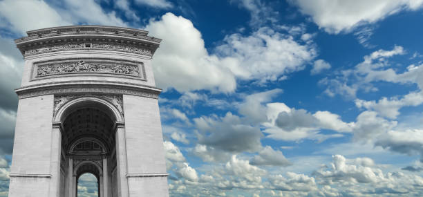 Arc de Triomphe (against the background of sky with clouds), Paris, France. The walls of the arch are engraved with the names of 128 battles and names of 660 French military leaders (in French) Arc de Triomphe (against the background of sky with clouds), Paris, France. The walls of the arch are engraved with the names of 128 battles and names of 660 French military leaders (in French) names of marbles stock pictures, royalty-free photos & images