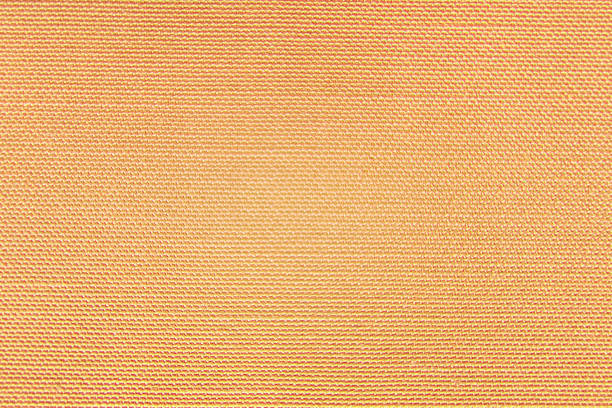 istock golden fabric wrinkled as a background closeup silk 1505927858
