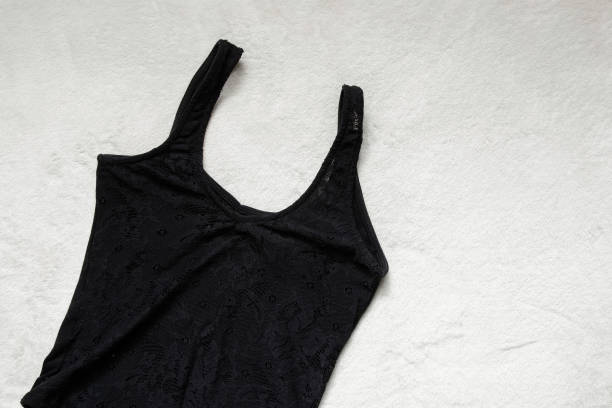 women's black t-shirt on a white background close up