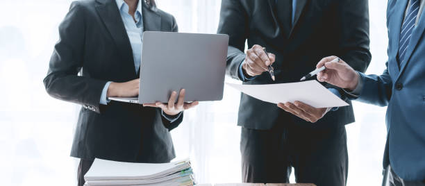 istock Successful Business Team Meeting Pointing at Graph for Strategic Planning and Growth. Teamwork Meeting with Graph Analysis and Collaboration. Corporate Collaboration and Analysis Concept. 1505989066