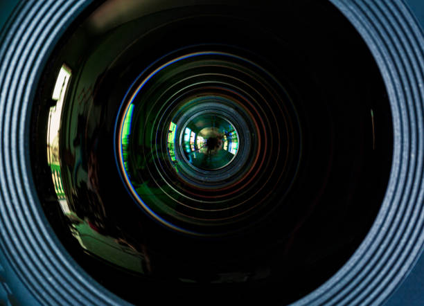 istock Camera lens on black background. Aperture blades. Camera lens close up 1506010594