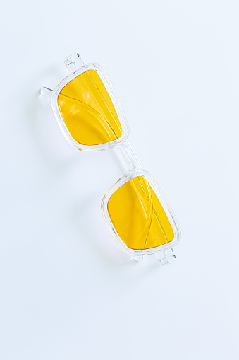 Yellow fashion glasses isolated white background,Circle yellow vintage glasses isolated on white background,Pair of modern, stylish sunglasses isolated on white