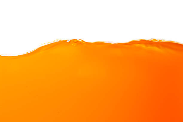 istock Orange juice isolated white background,orange juice texture on white background,Close up bright orange juice texture for health and nature waves 1506012898