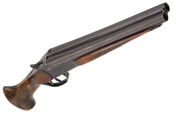 istock Sawn-off shotgun isolated on white. 1506034833