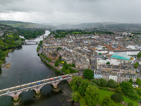 An aerial drone photo of Perth in Scotland. Perth is a beautiful town with a large river running through the town centre.