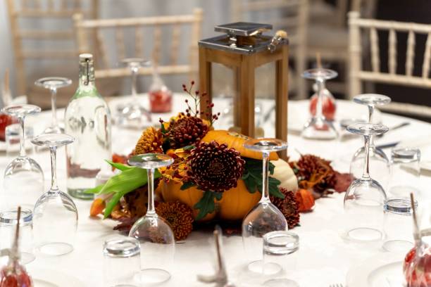 a close up shot of a wedding table with beautiful decorations