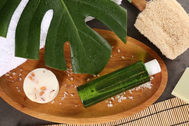 istock Card with word Retreat, different spa products and green palm leaf on textured table, flat lay 1506166985