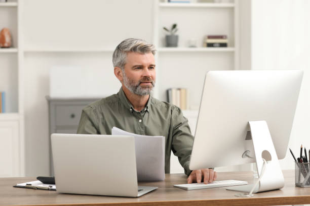 istock Professional accountant working at wooden desk in office 1506179416