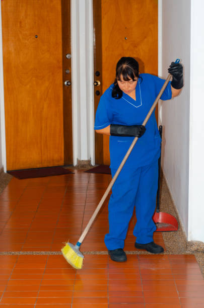 istock cleaning woman sweeping the building halls and copy space 1506179978
