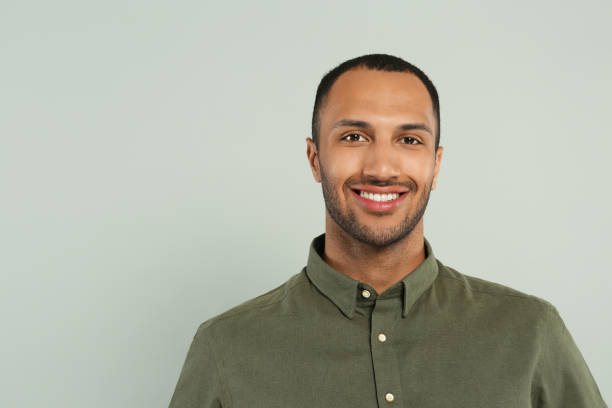 istock Portrait of handsome young man on gray background, space for text 1506179990