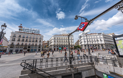 Madrid, Spain - June 20, 2023: Entrance to the Puerta del Sol Metro station in Madrid. Sol station is located at the Puerta del Sol square and is the most central station on the Metro, located at the Puerta del Sol square, and is one of the busiest stations of the Madrid Metro.