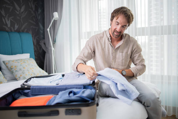 istock Businessman in a hotel room 1506229628