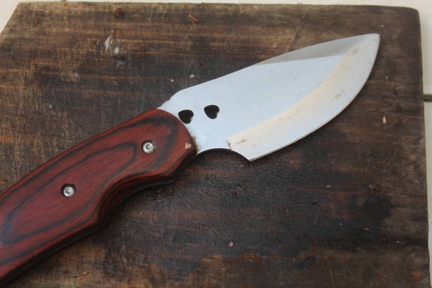 istock sharp knives on a wooden cutting board 1506350668