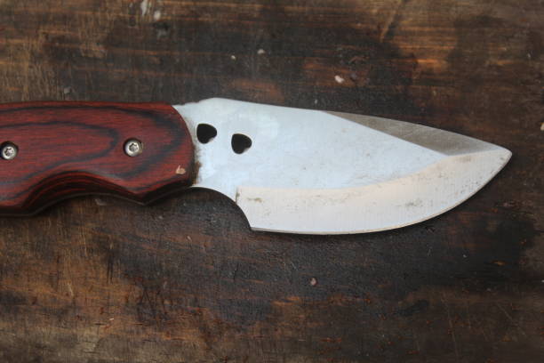 istock sharp knives on a wooden cutting board 1506351714