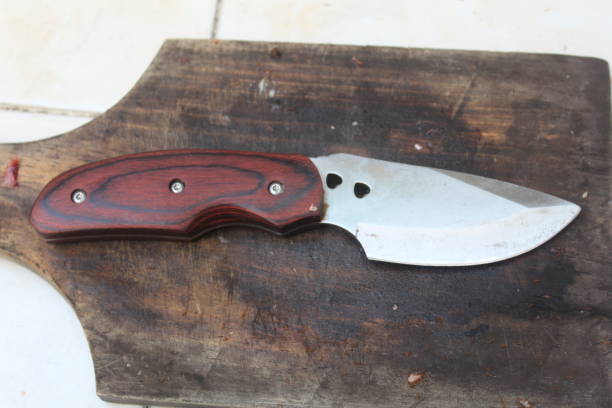 istock sharp knives on a wooden cutting board 1506351715