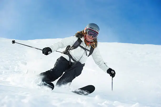 Photo of Skier skiing on snowy slope