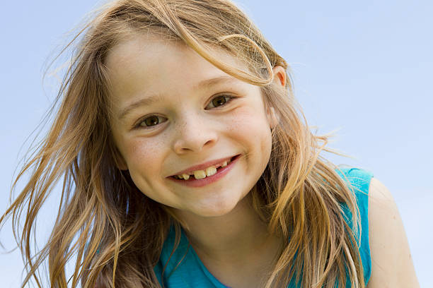 Close up of girls smiling face  one girl only stock pictures, royalty-free photos & images