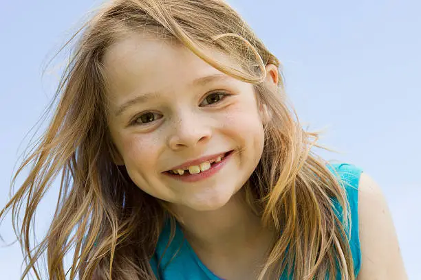 Photo of Close up of girls smiling face