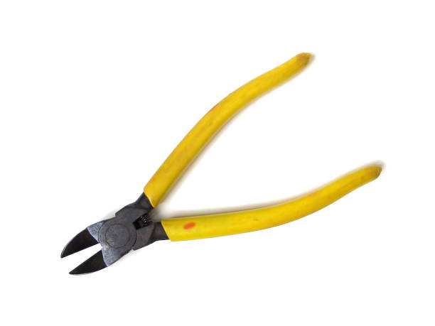 istock Close up of yellow handle cutting pliers isolated on white background. 1506388764
